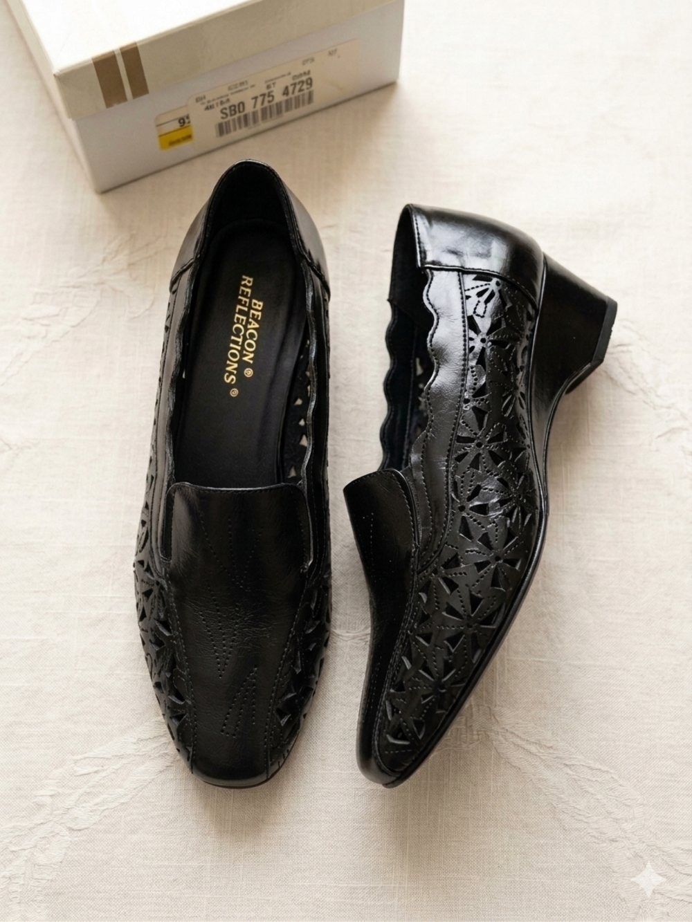Black Laser-Cut Leather Slip-On Loafers